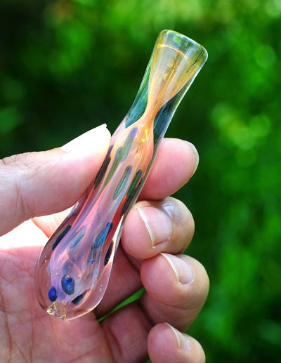 Compact 3.5-inch glass chillum with colored details and a flared end