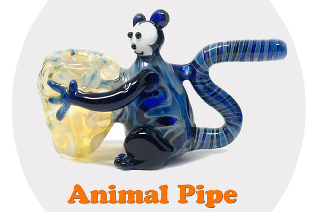 Glass animal pipe with panda design on a white background
